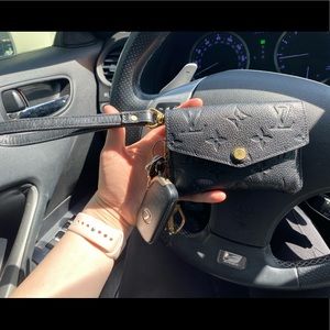 Louis Vuitton wristlet with leather wristlet and Louis Vuitton Keychain